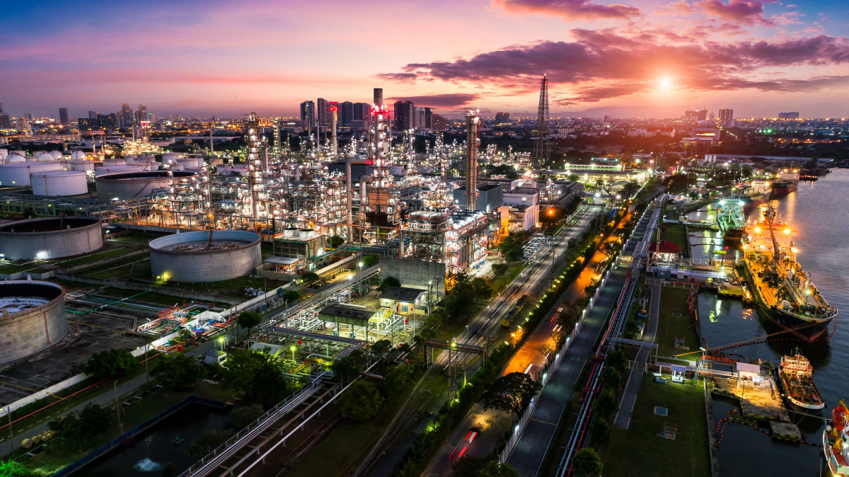 A long distance view of a petrochemical plant at night time.