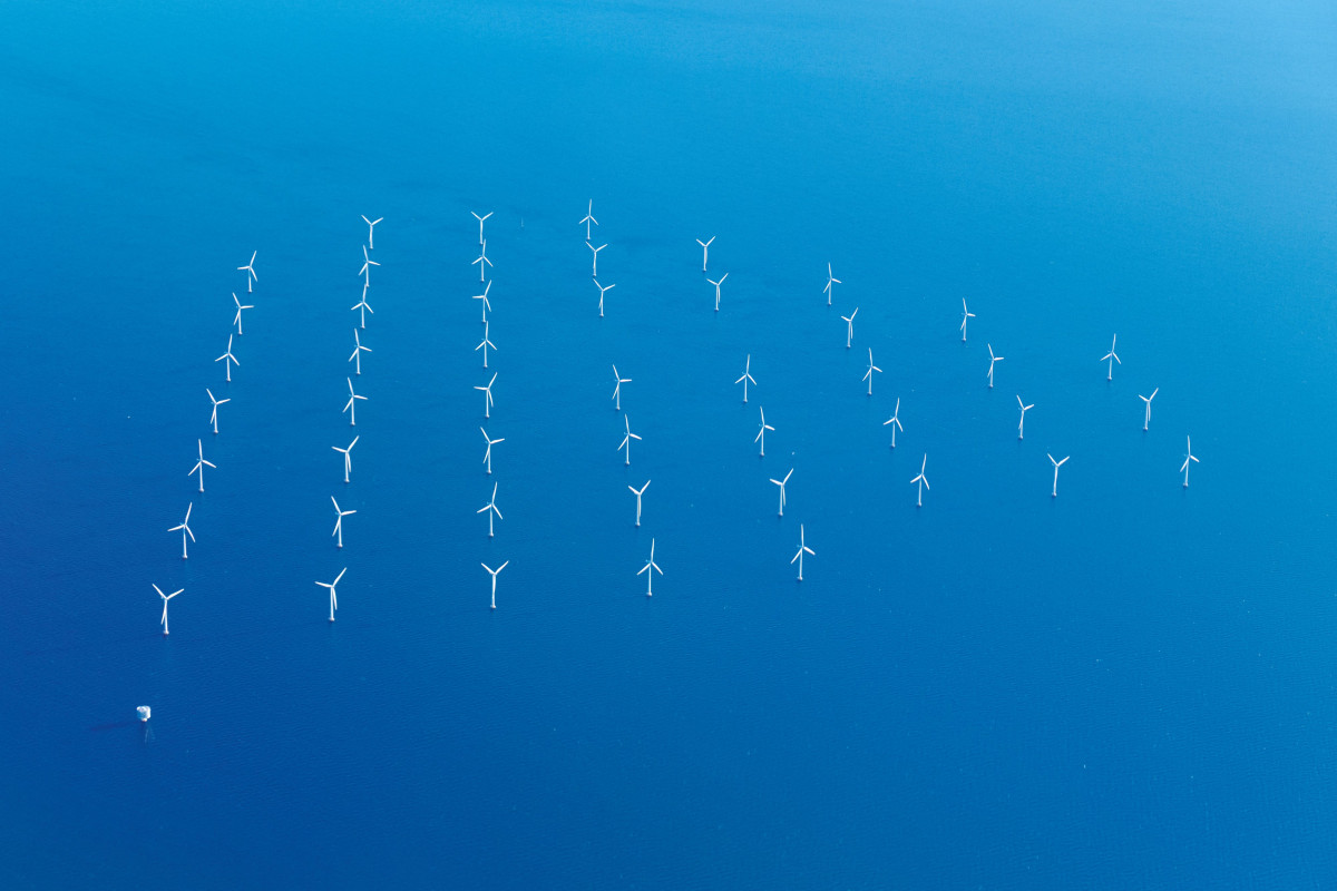 A Wind Farm Offshore On A Clear Day